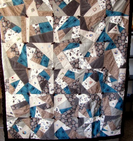 The beautiful crazy quilt my mom made for me.  